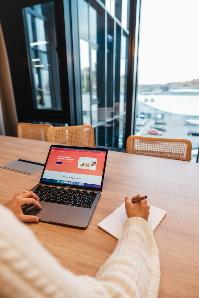 Professional working on a website design project on a laptop
